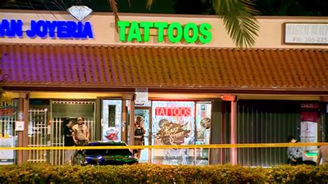 1 hospitalized following armed ambush outside of Tattoo shop in .